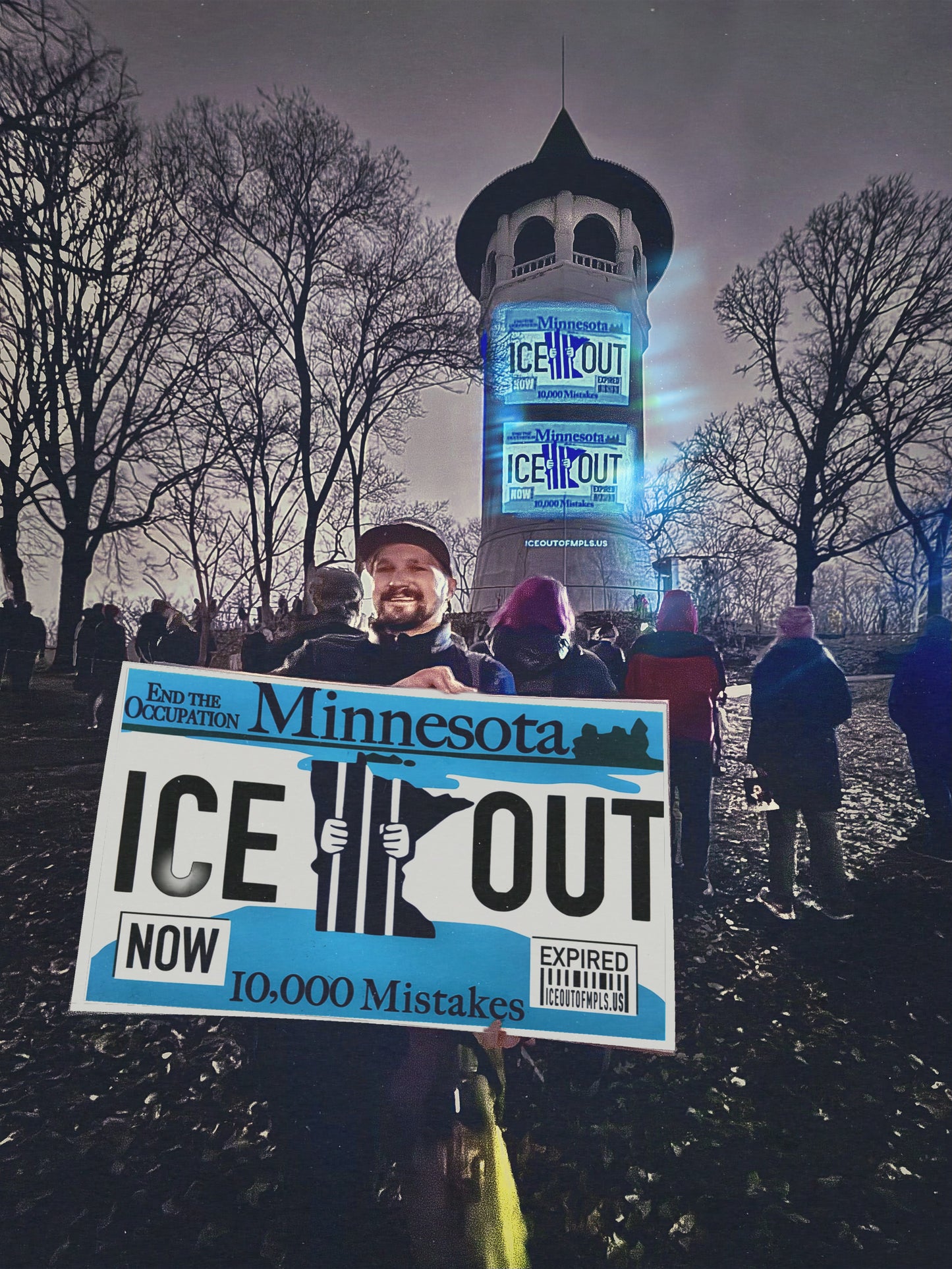 Activist holding Large format print ICE OUT MN license plate protest poster at Minneapolis rally